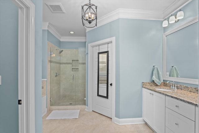 bathroom featuring tile patterned flooring, vanity, a notable chandelier, walk in shower, and crown molding