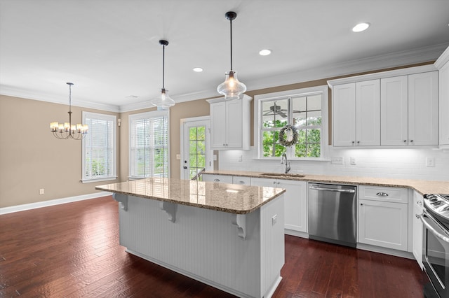 884 Willow Lk, Evans, GA 30809 - kitchen featuring dark wood finished floors, stainless steel appliances, a kitchen island, white cabinets, and a sink