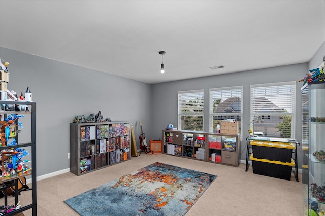 playroom featuring visible vents, carpet flooring, and baseboards