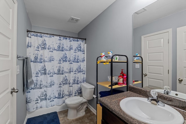 full bathroom featuring visible vents, vanity, baseboards, toilet, and shower / tub combo with curtain