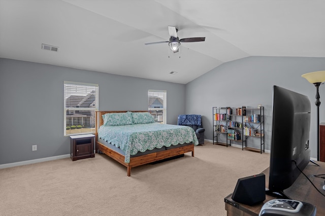 bedroom with visible vents, carpet, baseboards, and vaulted ceiling