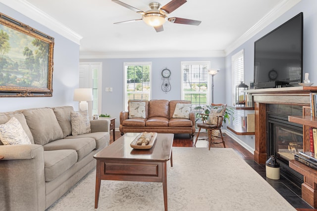 4161 Eagle Nest Dr, Evans, GA 30809 - living area with a fireplace with flush hearth, crown molding, a ceiling fan, and baseboards