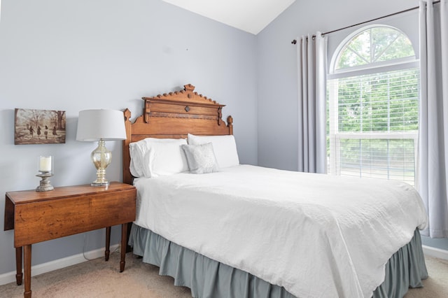 4161 Eagle Nest Dr, Evans, GA 30809 - bedroom with vaulted ceiling, carpet, and baseboards