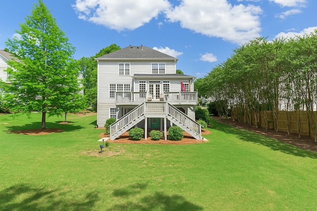 4161 Eagle Nest Dr, Evans, GA 30809 - back of property featuring stairway, a deck, and roof with shingles