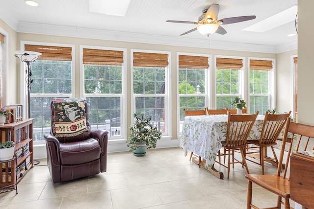 4161 Eagle Nest Dr, Evans, GA 30809 - sunroom featuring a skylight, ornamental molding, tile patterned floors, and recessed lighting