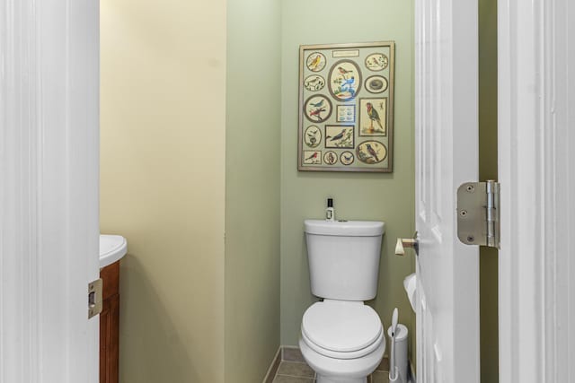 4161 Eagle Nest Dr, Evans, GA 30809 - bathroom with toilet, tile patterned floors, vanity, and baseboards