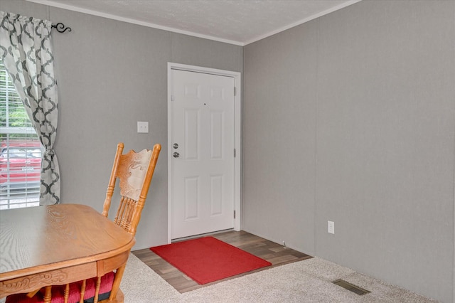 1711 Carolyn Lake Cir, Thomson, GA 30824 - foyer featuring ornamental molding and carpet