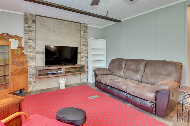 1711 Carolyn Lake Cir, Thomson, GA 30824 - living room featuring wood finished floors, a textured ceiling, crown molding, and ceiling fan