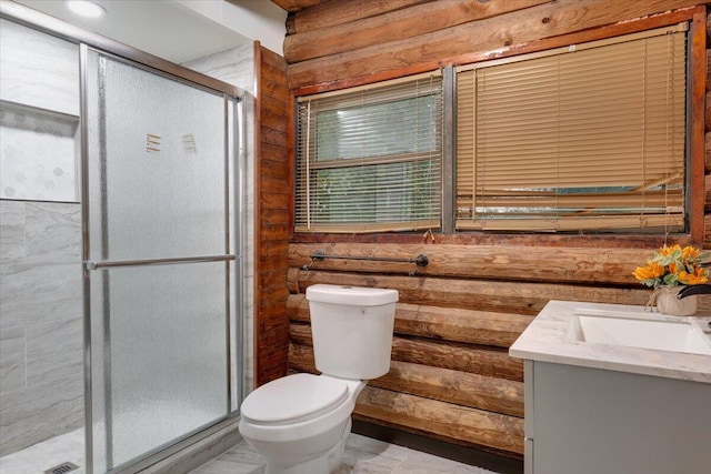 bathroom with rustic walls, toilet, vanity, and walk in shower