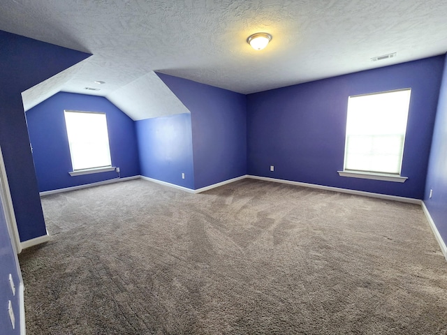 437 Arrowwood Dr, Grovetown, GA 30813 - bonus room with carpet flooring, baseboards, visible vents, and vaulted ceiling