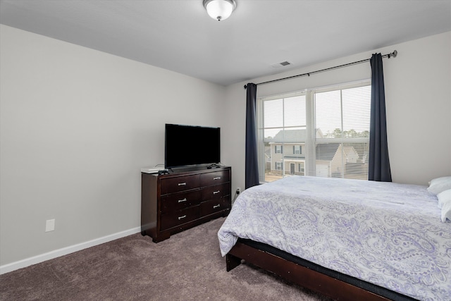 bedroom with light colored carpet