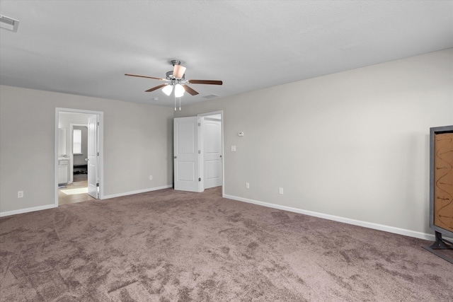 unfurnished bedroom featuring ceiling fan and carpet flooring