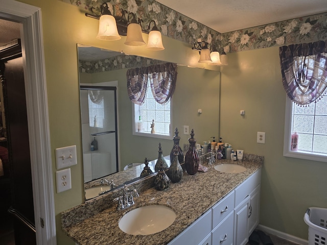 bathroom featuring vanity and walk in shower