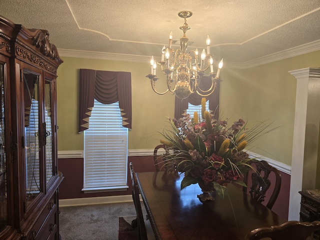 carpeted dining room featuring crown molding, a chandelier, and a textured ceiling