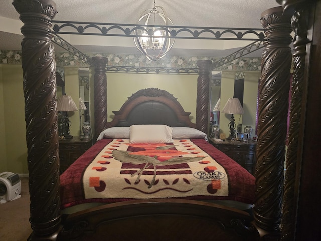 bedroom featuring a notable chandelier, carpet floors, and a textured ceiling