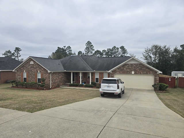 ranch-style house with a front lawn and a garage