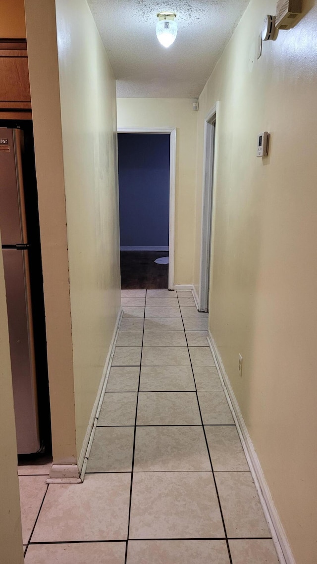 2929 Dahlia Dr, Augusta, GA 30906 - hall with light tile patterned flooring and a textured ceiling