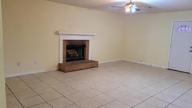 2929 Dahlia Dr, Augusta, GA 30906 - unfurnished living room with ceiling fan, light tile patterned flooring, and a brick fireplace