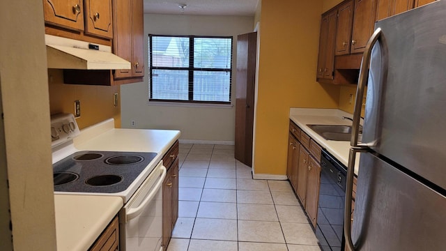 2929 Dahlia Dr, Augusta, GA 30906 - kitchen with freestanding refrigerator, white range with electric stovetop, under cabinet range hood, dishwasher, and light countertops