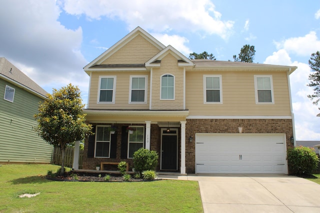 130 Clarinbridge Ln, Grovetown, GA 30813 - craftsman house with a front lawn, a garage, concrete driveway, and brick siding
