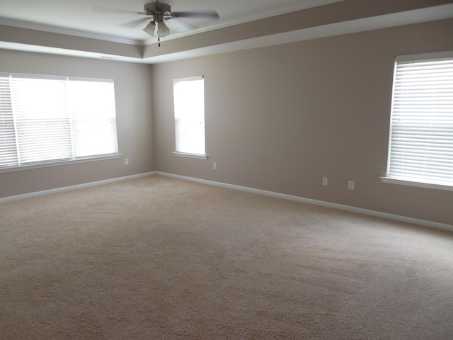130 Clarinbridge Ln, Grovetown, GA 30813 - empty room featuring a ceiling fan, baseboards, light colored carpet, healthy amount of natural light, and crown molding