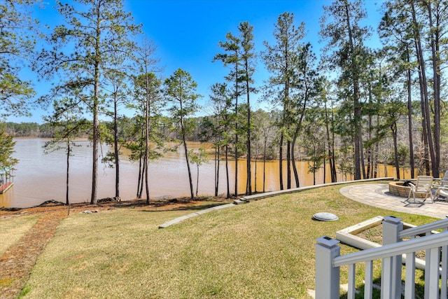 341 Crown Pt, Mccormick, SC 29835 - view of yard with a patio area, an outdoor fire pit, and a water view