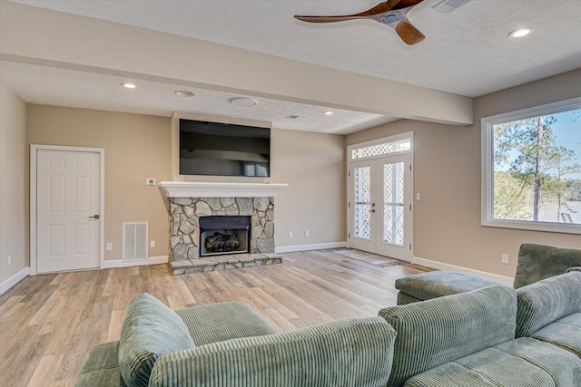 341 Crown Pt, Mccormick, SC 29835 - living area featuring wood finished floors, visible vents, french doors, baseboards, and ceiling fan