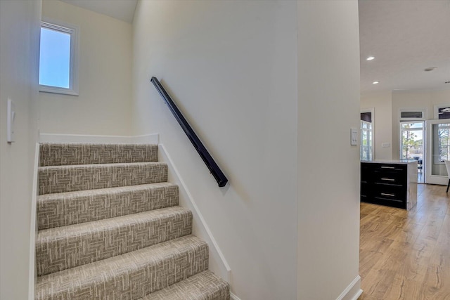 341 Crown Pt, Mccormick, SC 29835 - stairs with plenty of natural light, baseboards, and wood finished floors