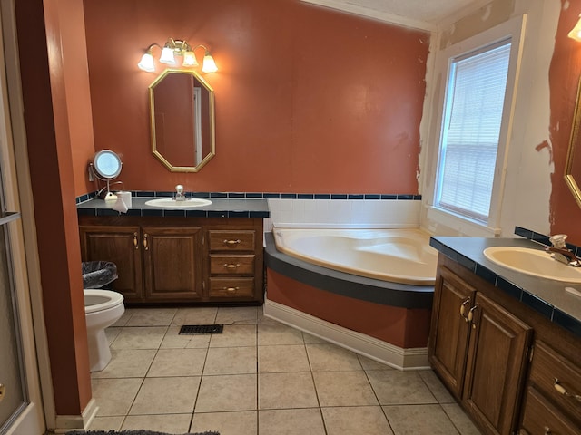 6712 Janes Rd, Appling, GA 30802 - full bath with a garden tub, two vanities, tile patterned flooring, and a sink