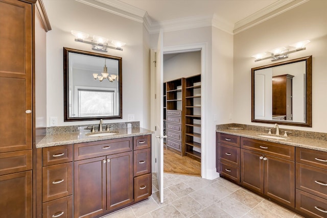 151 Commonwealth Way, Aiken, SC 29803 - full bath featuring ornamental molding, two vanities, a chandelier, and a walk in closet
