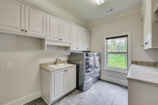 151 Commonwealth Way, Aiken, SC 29803 - laundry room with cabinet space, washing machine and dryer, and crown molding