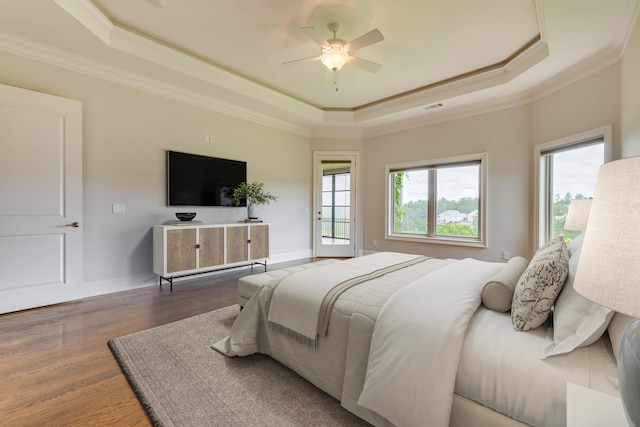151 Commonwealth Way, Aiken, SC 29803 - bedroom with a raised ceiling, ornamental molding, wood finished floors, and ceiling fan