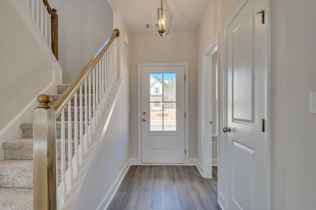 1282 Elias Sta, Thomson, GA 30824 - doorway to outside with wood finished floors, stairs, and baseboards