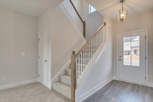 1282 Elias Sta, Thomson, GA 30824 - foyer featuring stairs, a chandelier, and baseboards