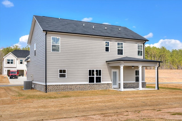 1282 Elias Sta, Thomson, GA 30824 - rear view of house featuring a ceiling fan, a yard, central AC, and a patio area