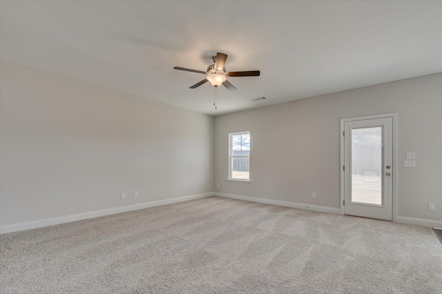 1282 Elias Sta, Thomson, GA 30824 - empty room with baseboards, a ceiling fan, and light colored carpet