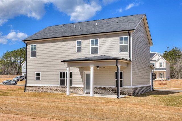 1282 Elias Sta, Thomson, GA 30824 - back of house featuring ceiling fan, a lawn, and a patio area