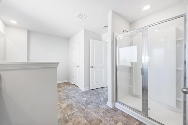 bathroom featuring walk in shower