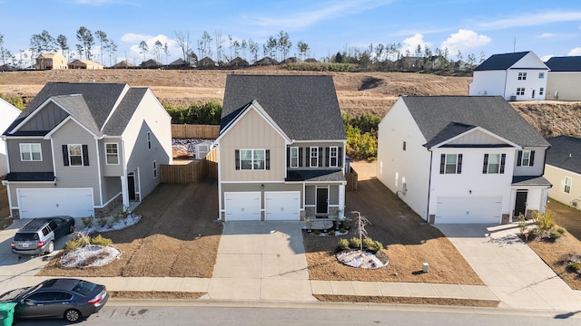 front facade with a garage