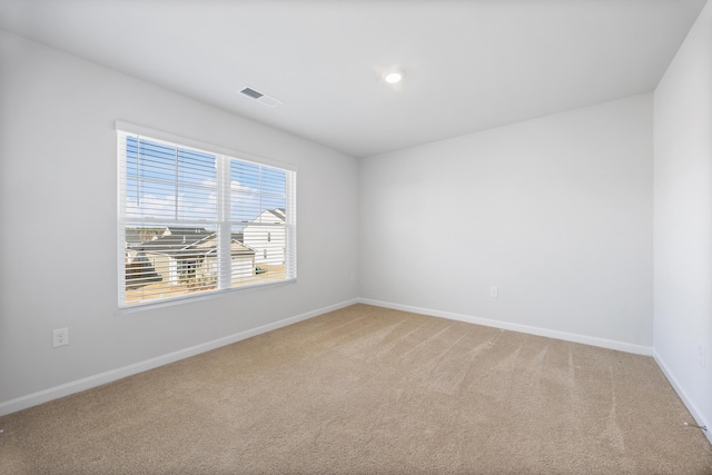 view of carpeted spare room