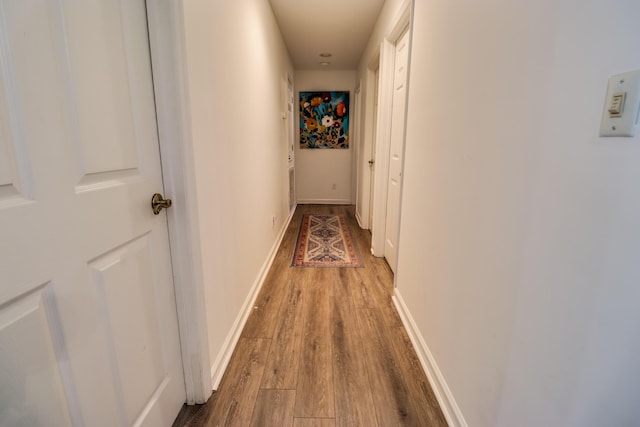 hall with light wood-type flooring