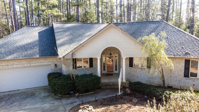 view of front of home with a garage