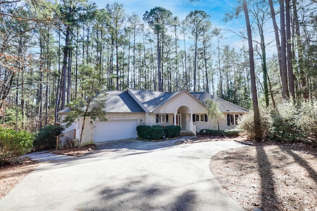 single story home with a garage