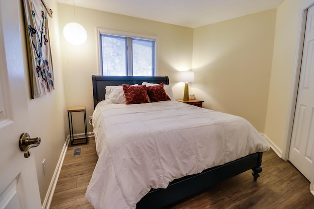 bedroom featuring hardwood / wood-style floors