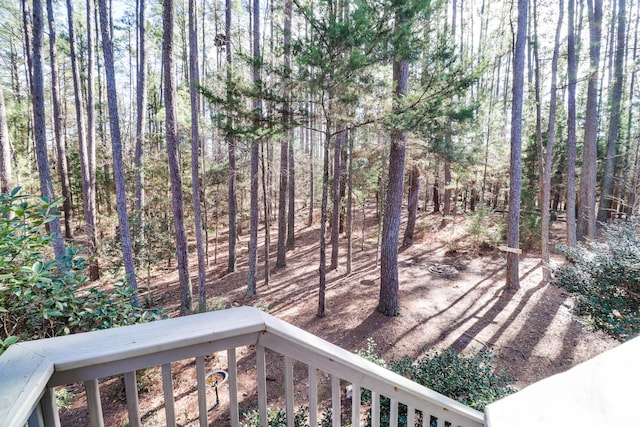 view of yard with a balcony