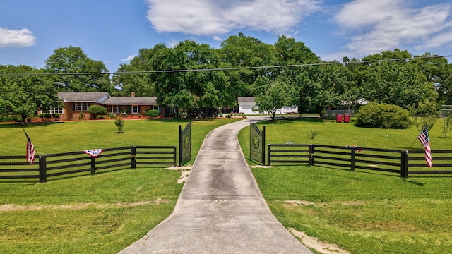 226 Elam Hts, Lincolnton, GA 30817 - view of concrete driveway featuring a gated entry