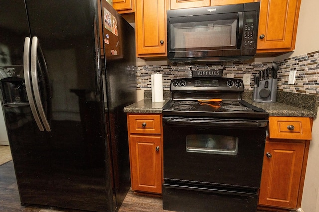 3107 Camden Way, Graniteville, SC 29829 - kitchen featuring black appliances, decorative backsplash, dark countertops, and brown cabinets