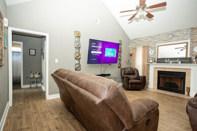 3107 Camden Way, Graniteville, SC 29829 - living room featuring high vaulted ceiling, wood finished floors, ceiling fan, and a tiled fireplace