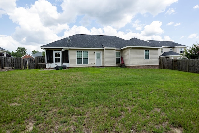 3107 Camden Way, Graniteville, SC 29829 - rear view of house featuring a fenced backyard, a sunroom, and a shingled roof