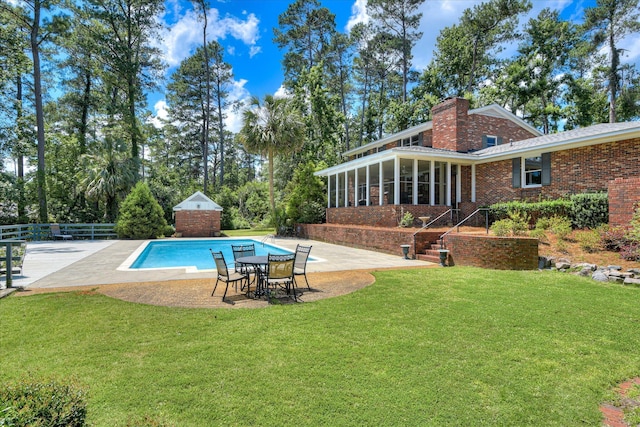 802 Dunbarton Dr, North Augusta, SC 29841 - outdoor pool featuring a sunroom and a patio area
